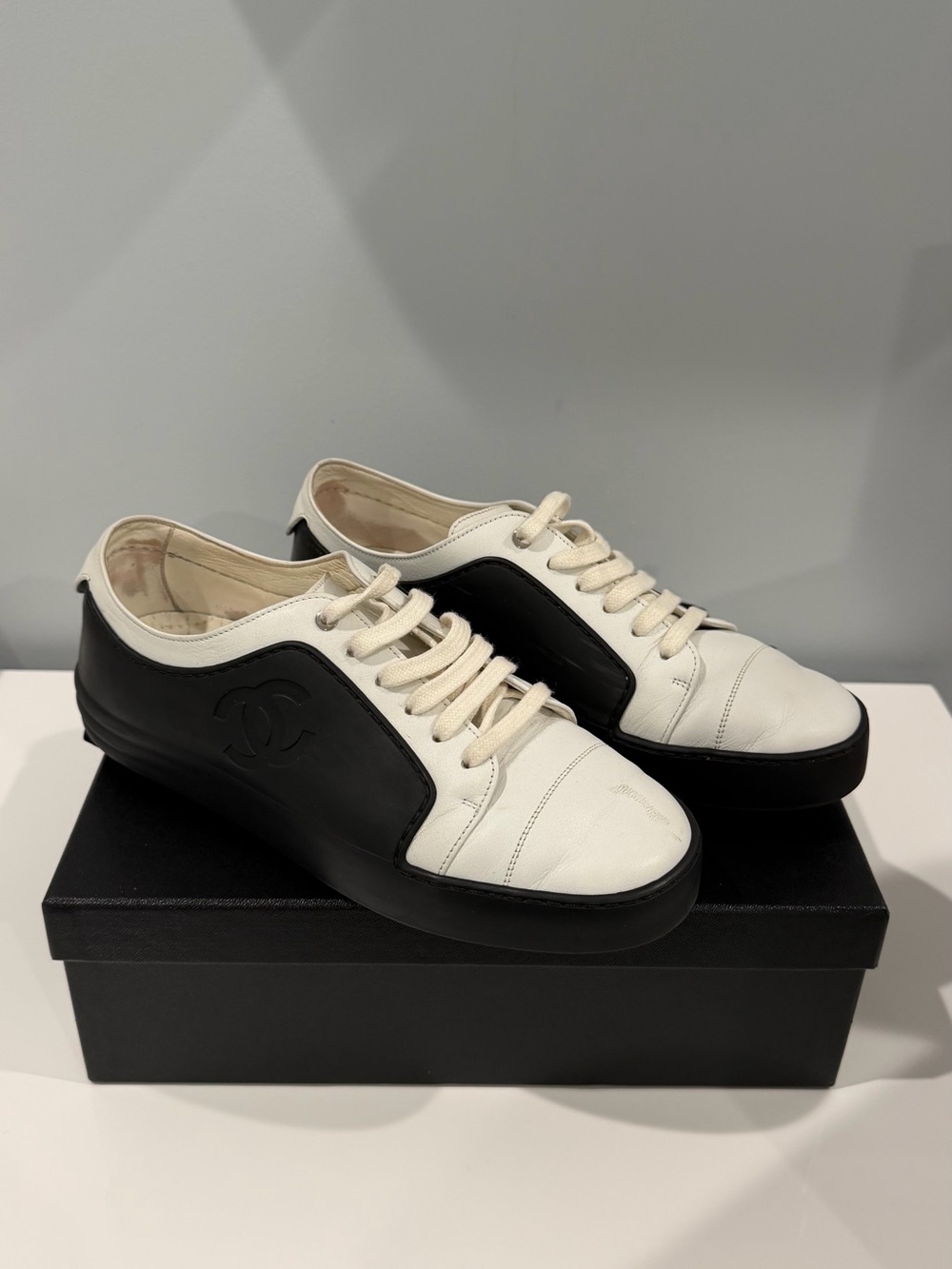 CHANEL Black and White Low-Top Leather Sneakers